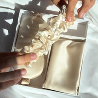 Unboxing video of the Dore and Rose Luxury Soft Silk Pillowcase in the color Champagne Beige