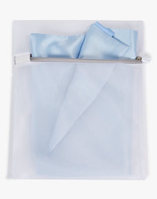 Premium Dore and Rose White Washing Bag for Silk products containing the Dore and Rose Silk Pillowcase in the color Sky Blue