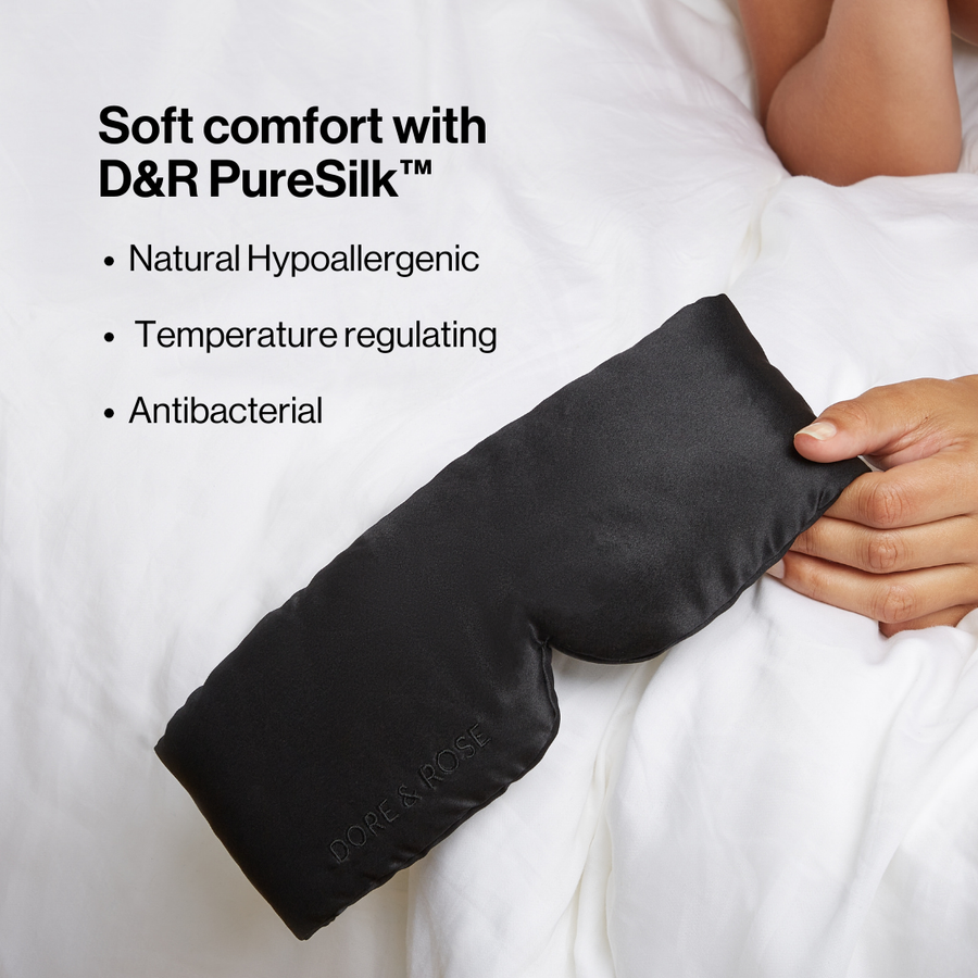 Dore and Rose Luxury Soft Silk Sleeping Eye Mask in the color black with its benefits listed beside it