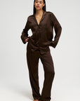 Woman wearing silk PJ in brown, front shot image 2.