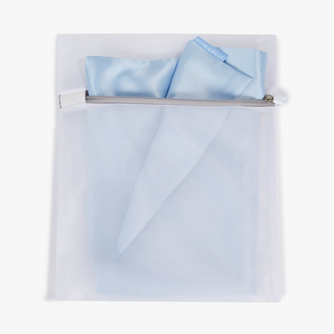 Premium Dore and Rose White Washing Bag for Silk products containing the Dore and Rose Silk Pillowcase in the color Sky Blue