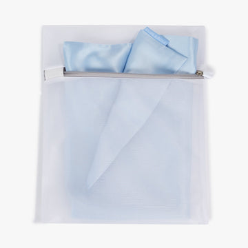 Premium Dore and Rose White Washing Bag for Silk products containing the Dore and Rose Silk Pillowcase in the color Sky Blue