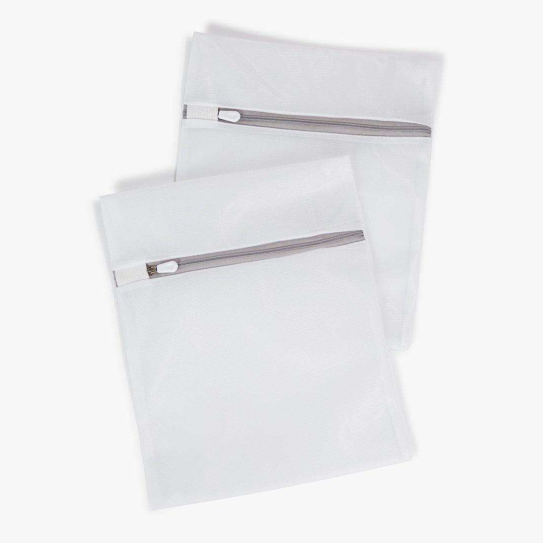 Two pieces of the Premium Dore and Rose White Washing Bag for Silk products 